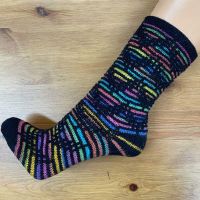 Set: Socken *Utopia* im LeftOver-Stil & 2 x 50 g Sockenwolle
